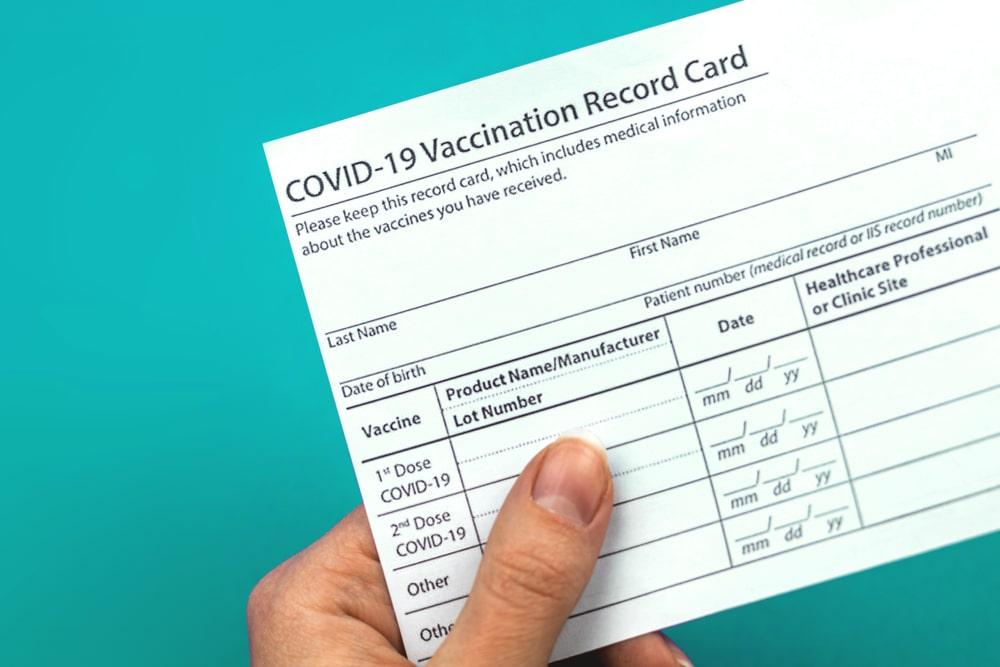 AI-Enabled COVID-19 Vaccination Compliance